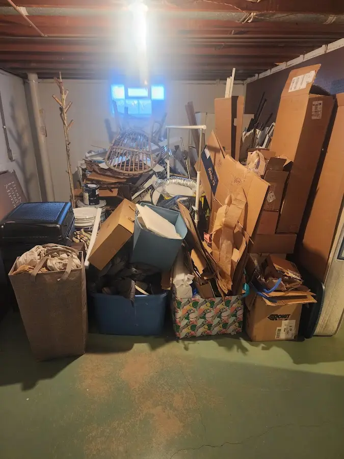 Roll-off dumpster container at job site for 15 Yard Dumpster Rental in Mounds View